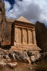 Low angle view of old ruins against sky