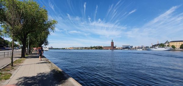 Scenic view of sea against blue sky