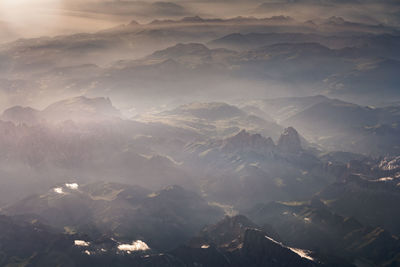 Scenic view of mountains against sky during sunset