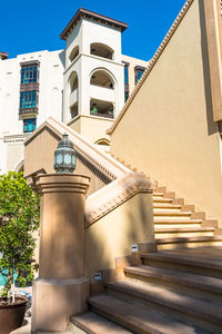 Low angle view of staircase and building against sky