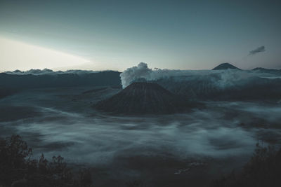 Scenic view of volcanic landscape against sky