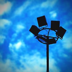 Low angle view of street light against sky