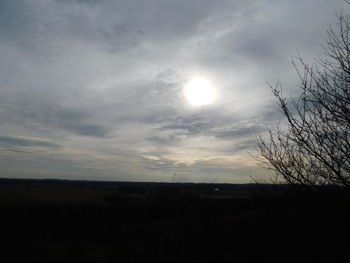 Silhouette landscape against sky during sunset