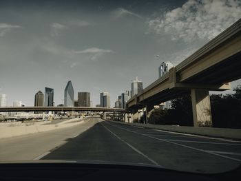 Road in city seen through car windshield in dallas highway 