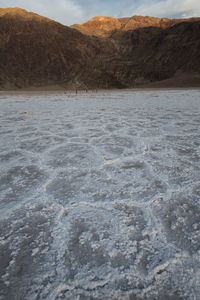 Scenic view of barren landscape against sky