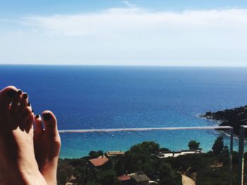 Scenic view of calm sea against clear sky