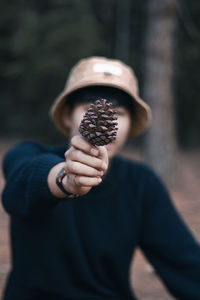 Portrait of man holding hand