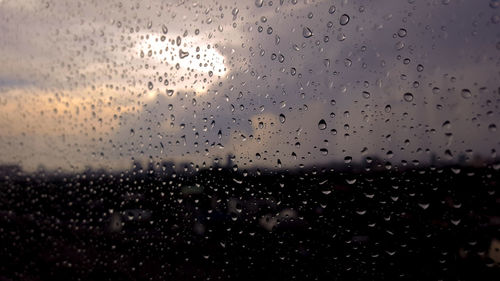 Full frame shot of wet glass window