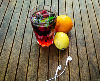 High angle view of fruits in jar on table