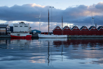 Boats in sea against sky