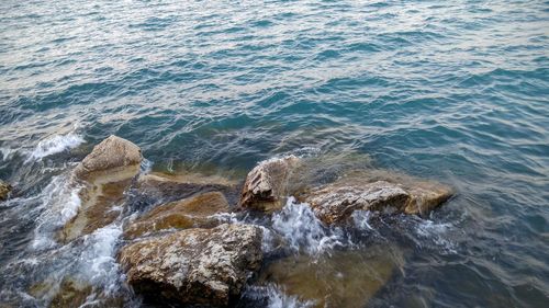 Waves splashing on rocks