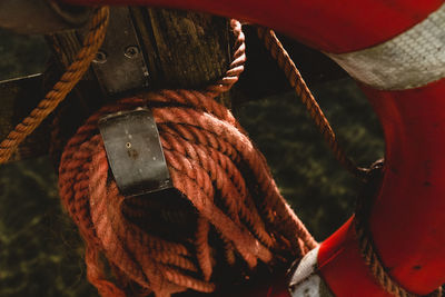 Close-up of rope tied on metal boat