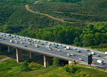 High angle view of highway by trees