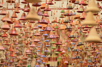 Full frame shot of colorful wind chimes for sale in store