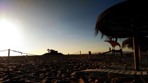 Scenic view of beach against clear sky