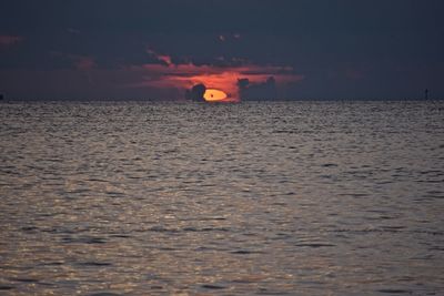 Scenic view of sea at sunset