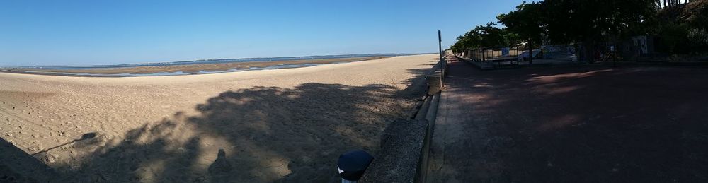 Panoramic view of road against clear sky