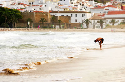 People enjoying at beach