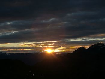 Scenic view of mountains at sunset