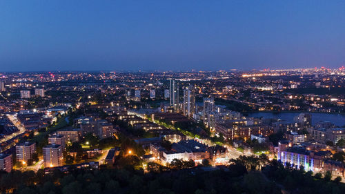 Aerial night drone view of london cityscape from finsbury park