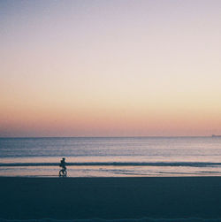 Scenic view of sea at sunset