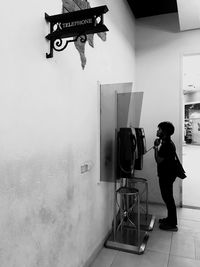 Full length of man photographing
