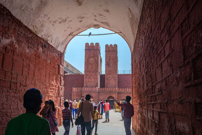 People walking in tunnel