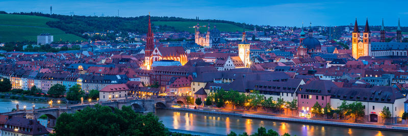 High angle view of illuminated city buildings