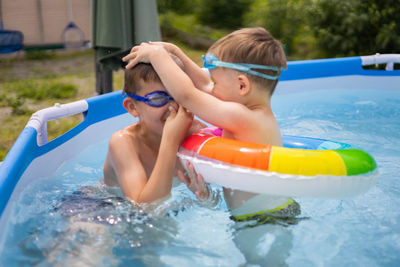 Close-up of woman swimming in pool