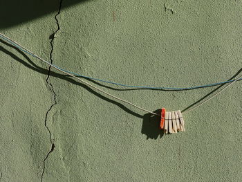 High angle view of shadow on cable