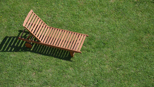 Easy chair on a lawn shot from above