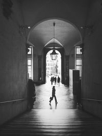 Full length of woman walking in corridor