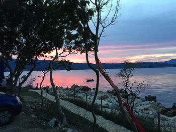 Scenic view of sea at sunset