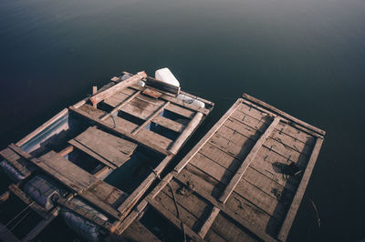 High angle view of abandoned pier over sea