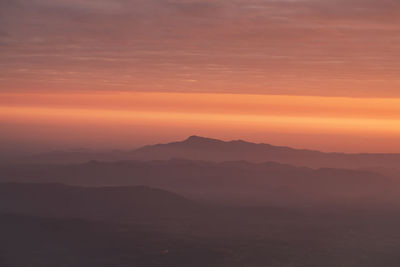 Layer of mountains with misty in morning