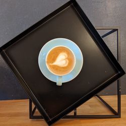 High angle view of cappuccino on table