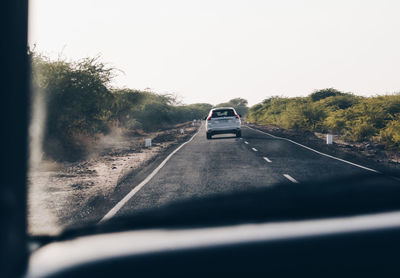 Car on road against sky