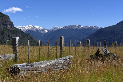 A typical fence in the chilean patagonia. beauty in every direction.