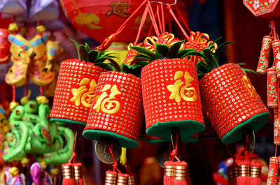 Close-up of lanterns hanging at market stall