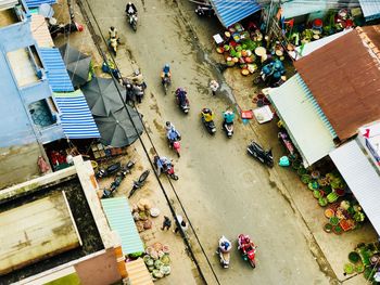 High angle view of people at market in city