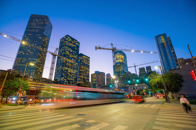 Illuminated buildings in city