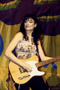 Young woman playing guitar