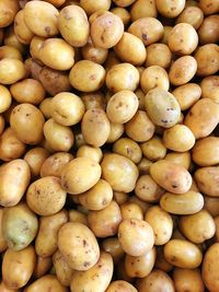 Full frame shot of onions for sale at market stall