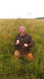 Portrait of man on field