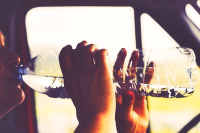 Close-up of hand holding ice cream