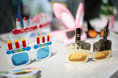 Close-up of novelty glasses on table at party