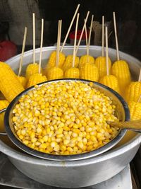 Close-up of yellow fruits in bowl