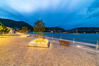 The new lakeside promenade of como, photographed at dusk.