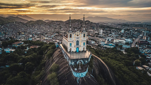 High angle view of city against sky during sunset