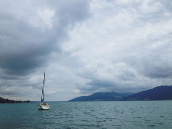 Scenic view of sea against cloudy sky